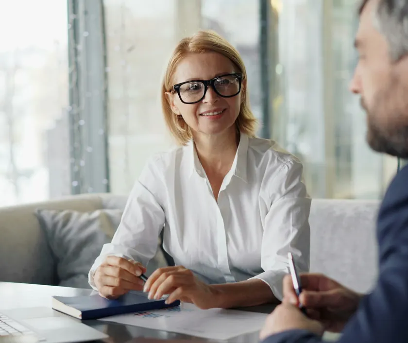 An adviser talking a client through her options